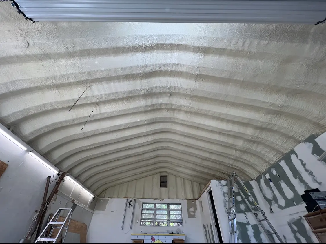 Spray polyurethane foam applied to the underside of a metal roof deck in Lititz